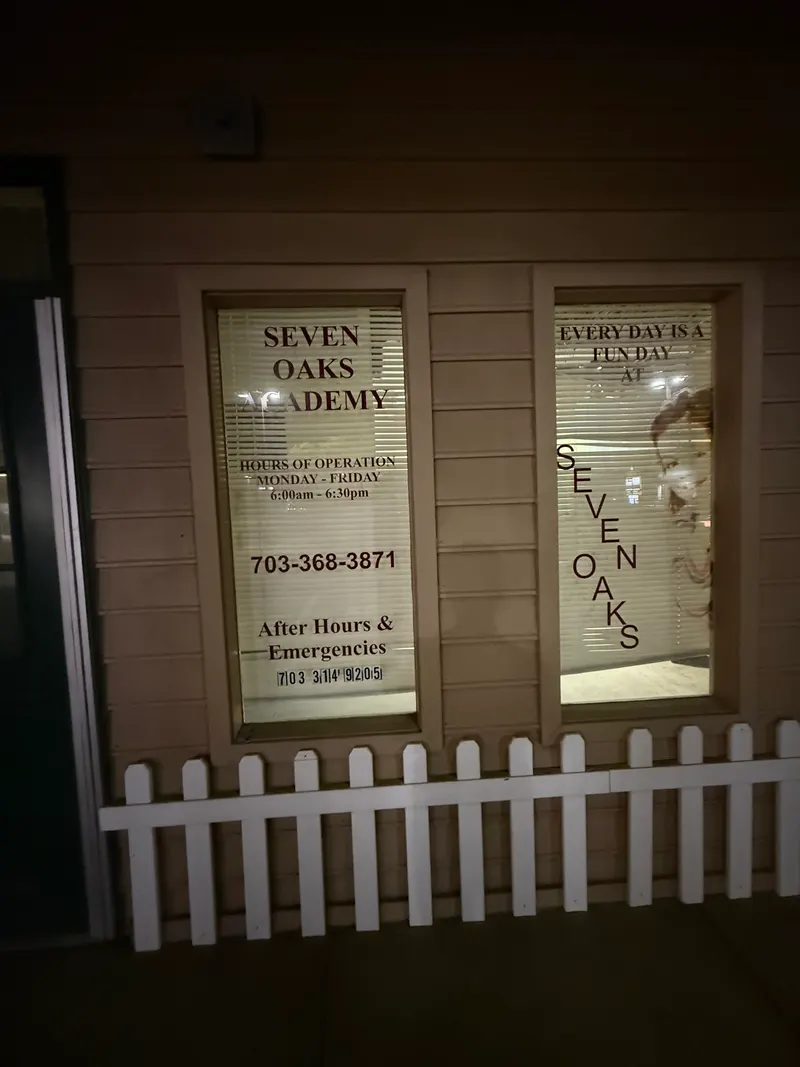Seven Oaks Academy window hours and branding